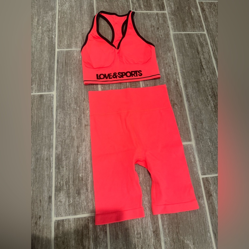LOVE & SPORTS NEON ORANGE BIKE SHORTS AND SPORTS BRA OUTFIT SET